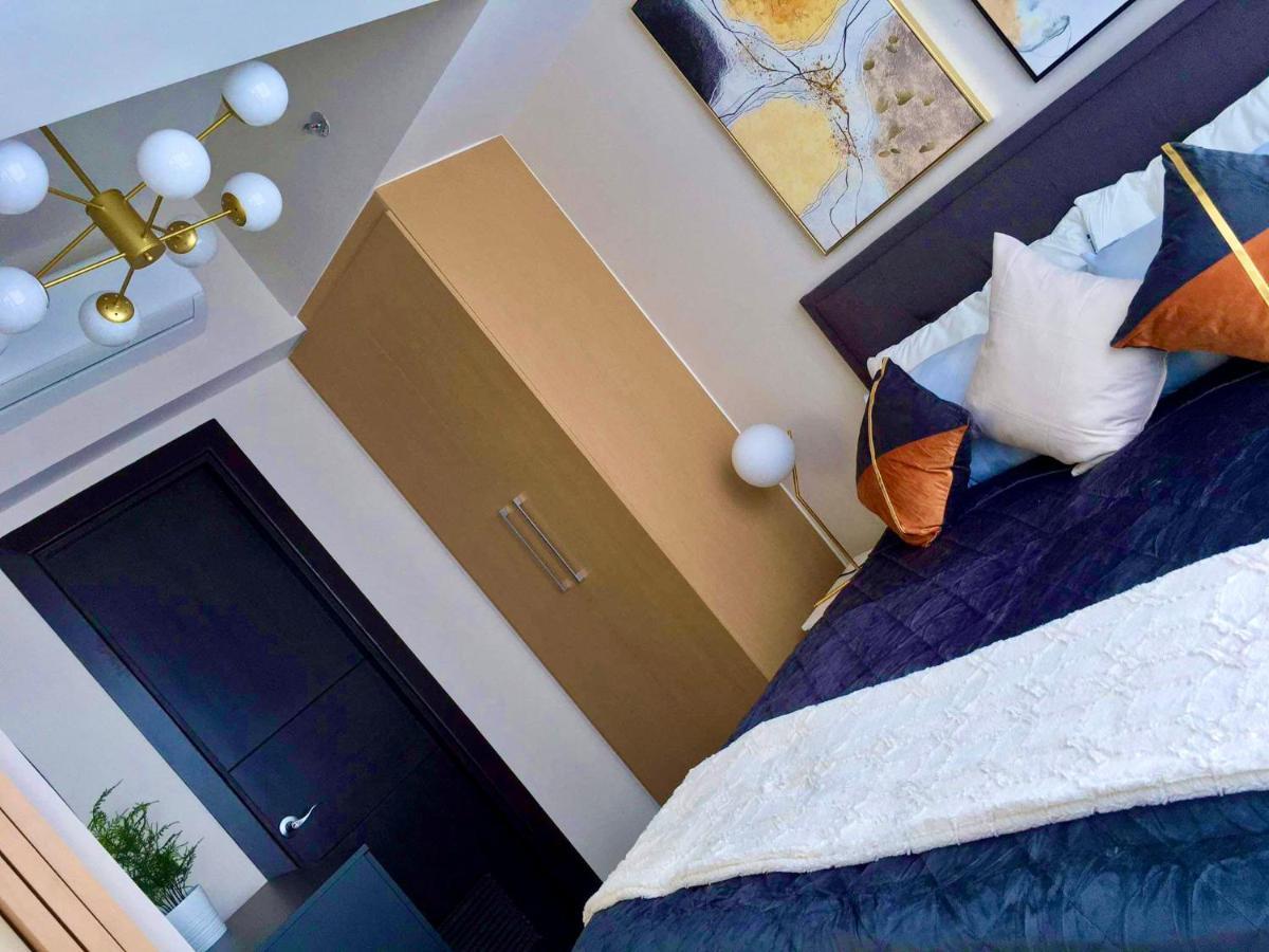 Daniella'S Modern & Cozy Suite In Uptown Bgc مانيلا المظهر الخارجي الصورة