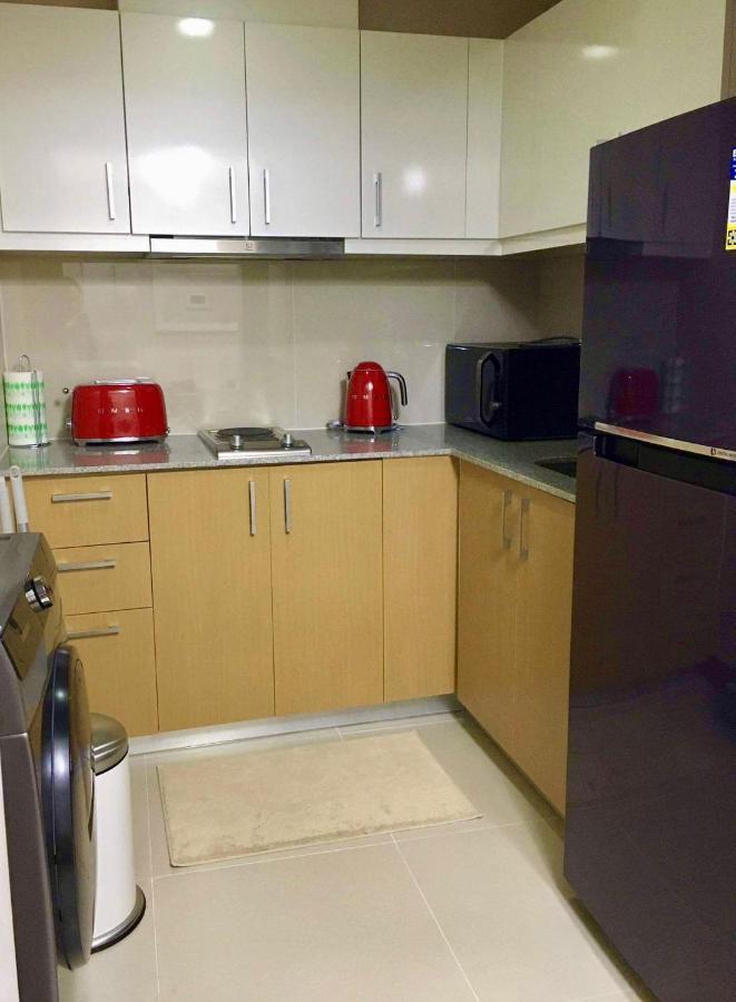 Daniella'S Modern & Cozy Suite In Uptown Bgc مانيلا المظهر الخارجي الصورة