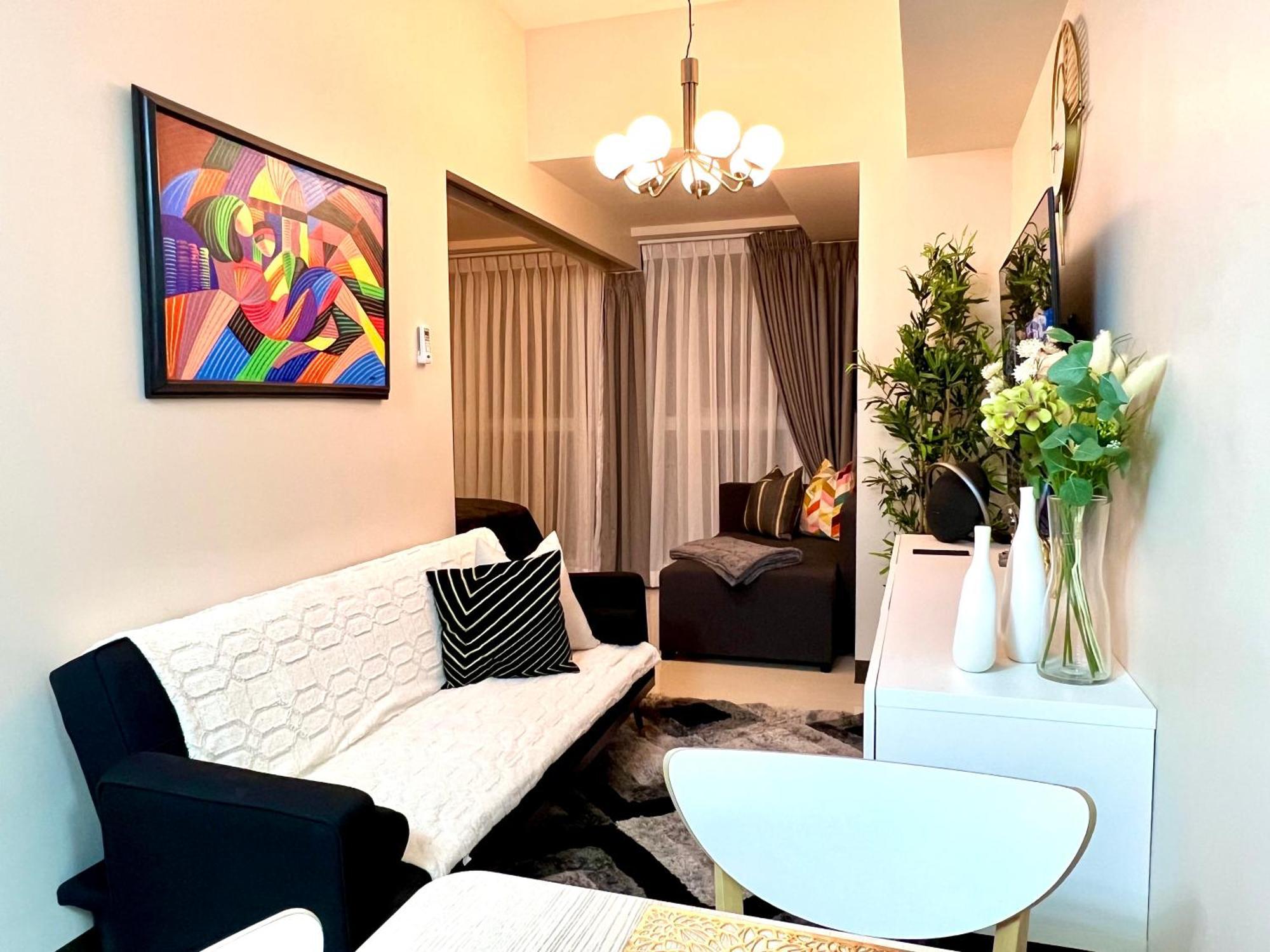 Daniella'S Modern & Cozy Suite In Uptown Bgc مانيلا المظهر الخارجي الصورة